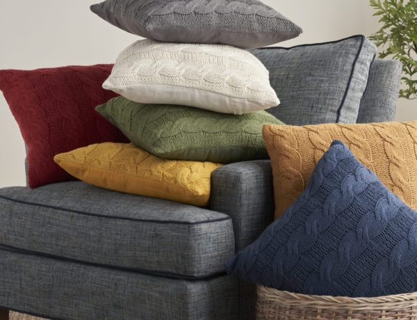 Pillows stacked on a chair