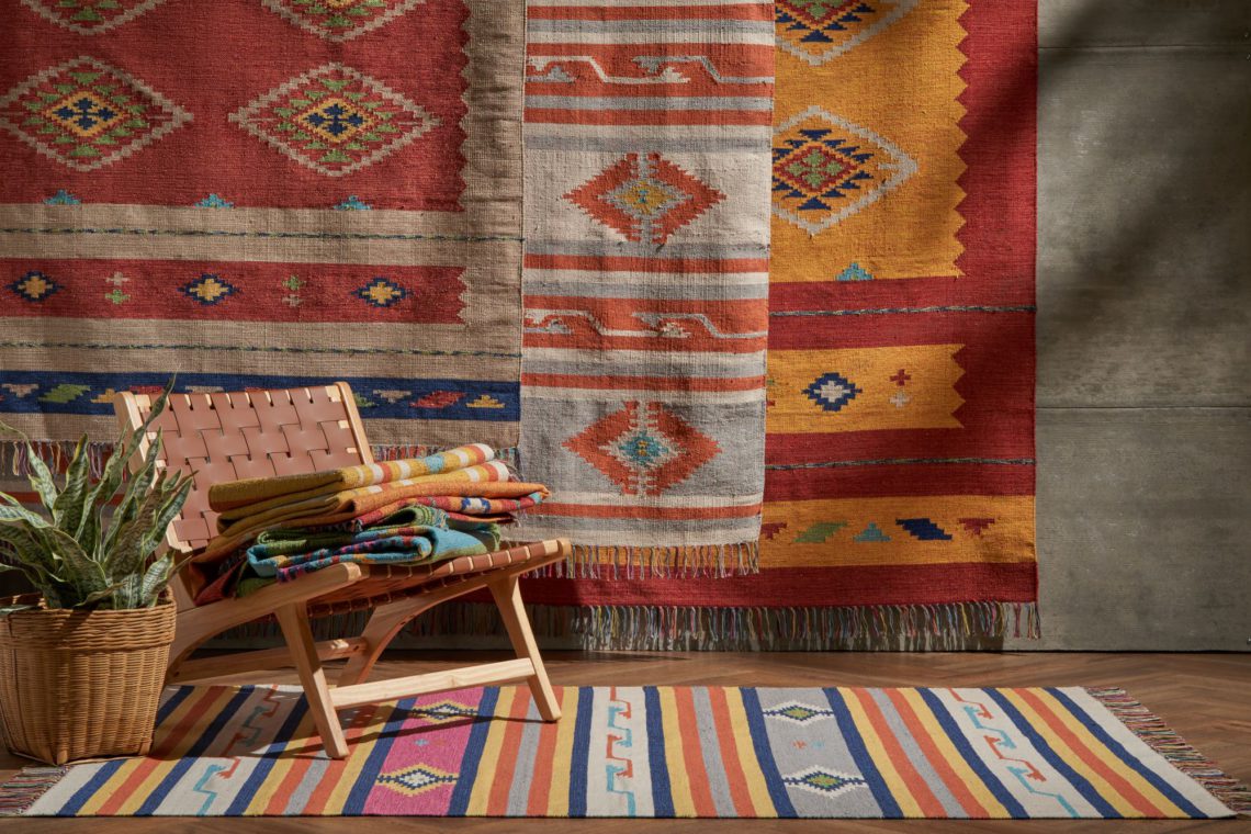 A group of southwestern style flatweave rugs