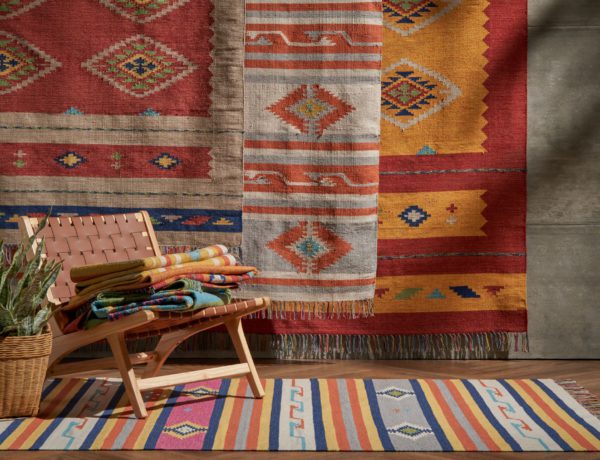 A group of southwestern style flatweave rugs